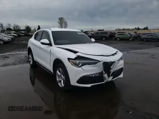 2018 Alfa Romeo Stelvio z VIN ZASFAKAN9J7B88322, wystawiony jako Copart lot #48808605 z przebiegiem 87 096 mil mil oraz Szkody całkowita. Historia ofert i sprzedaży dostępna na DreamBid. Obrazek 11.