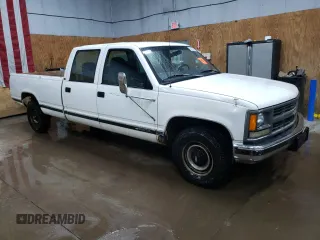 1997 Chevrolet Silverado 3500 z VIN 1GCGC33R9VF031799, wystawiony jako Copart lot #69377024 z przebiegiem 185 024 mil mil oraz Tytuł czysty. Historia ofert i sprzedaży dostępna na DreamBid. Obrazek 4.