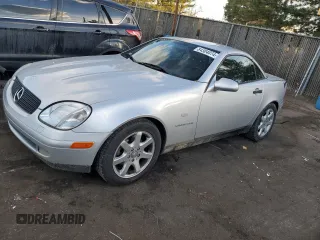 1999 Mercedes-Benz SLK-Class with VIN WDBKK47F8XF124592, listed as a Copart auction lot 84304074 with 68,483 mi miles and Salvage Title. Bid and sale history available at carsss.com. Image 1.