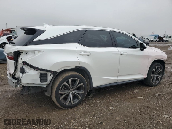 2020 Lexus RX 350L with VIN JTJHZKEA4L2015239, listed as a Copart auction lot 87478044 with 67,006 mi miles and Salvage title. Bid and sale history available at DreamBid. Image 3.