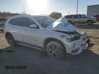 2018 BMW X1 xDrive28i with VIN WBXHT3C36J5K21286, listed as a Copart auction lot 88702365 with 0 mi miles and Salvage Title. Bid and sale history available at carsss.com. Image 4.