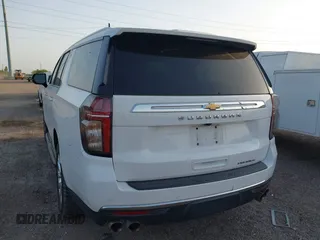 2022 Chevrolet Suburban Premier with VIN 1GNSCFKDXNR180648, listed as a IAAI auction lot 41853881 with 73,023 mi miles and . Bid and sale history available at DreamBid. Image 3.
