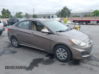2014 Hyundai Accent GLS z VIN KMHCT4AE4EU758926, wystawiony jako IAAI lot #42451816 z przebiegiem 80 387 mil mil oraz . Historia ofert i sprzedaży dostępna na DreamBid. Obrazek 1.