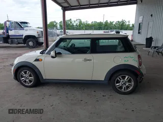 2011 MINI Hardtop with VIN WMWSU3C52BT091664, listed as a IAAI auction lot 42427367 with 110,488 mi miles and . Bid and sale history available at DreamBid. Image 14.
