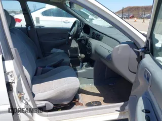 1997 Ford Escort LX z VIN 1FALP13P6VW331635, wystawiony jako IAAI lot #42338881 z przebiegiem 117 385 mil mil oraz . Historia ofert i sprzedaży dostępna na DreamBid. Obrazek 5.