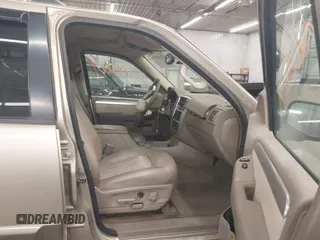 2003 Mercury Mountaineer Convenience z VIN 4M2ZU86K23ZJ06043, wystawiony jako IAAI lot #42215814 z przebiegiem 259 172 mil mil oraz . Historia ofert i sprzedaży dostępna na DreamBid. Obrazek 5.