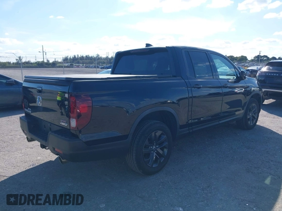 2022 Honda Ridgeline Sport with VIN 5FPYK3F15NB014541, listed as a IAAI auction lot 41514422 with 34,954 mi miles and . Bid and sale history available at DreamBid. Image 4.