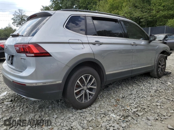2020 Volkswagen Tiguan SE with VIN 3VV2B7AX4LM022562, listed as a Copart auction lot 69816034 with 61,789 mi miles and Salvage Title. Bid and sale history available at DreamBid. Image 3.