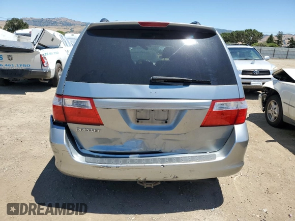 2006 Honda Odyssey EX-L z VIN 5FNRL38756B020403, wystawiony jako Copart lot #58294445 z przebiegiem 248 529 mil mil oraz Szkoda całkowita • Salvage title. Historia ofert i sprzedaży dostępna na DreamBid. Obrazek 6.