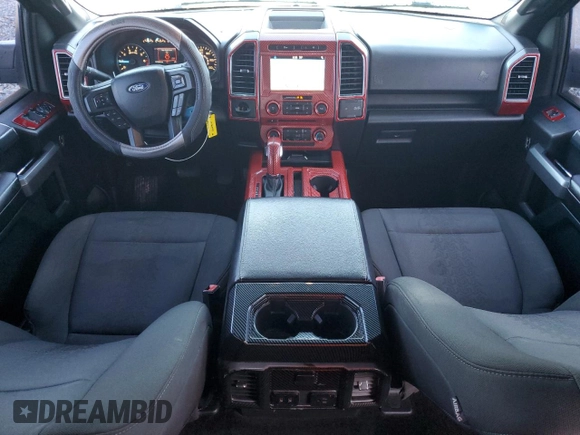 2018 Ford F-150 XL with VIN 1FTEW1CP0JFD02261, listed as a Copart auction lot 61850405 with 107,299 mi miles and Salvage title. Bid and sale history available at DreamBid. Image 8.