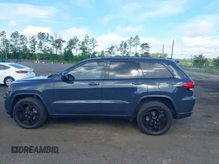 2018 Jeep Grand Cherokee Altitude with VIN 1C4RJFAG7JC394051, listed as a IAAI auction lot 42492771 with 147,669 mi miles and . Bid and sale history available at DreamBid. Image 14.
