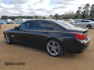 2015 BMW 7 Series 740Li with VIN WBAYE4C55FD947147, listed as a Copart auction lot 43274705 with 194,914 mi miles and Salvage Title. Bid and sale history available at DreamBid. Image 2.