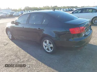 2012 Volkswagen Jetta Sedan TDI with VIN 3VW3L7AJ0CM409148, listed as a IAAI auction lot 41796513 with 167,269 mi miles. Bid and sale history available at carsss.com. Image 3.