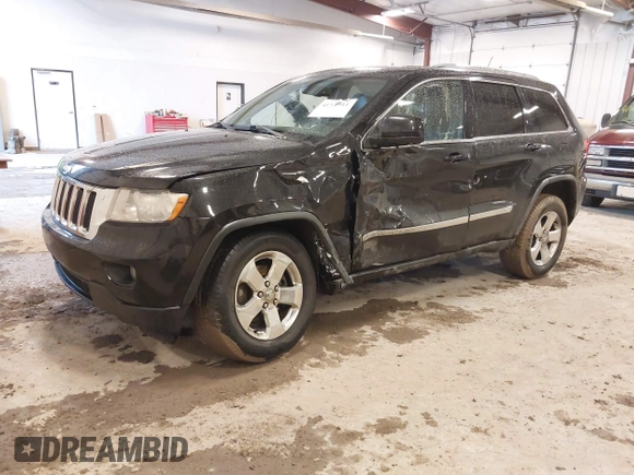 2012 Jeep Grand Cherokee Laredo with VIN 1C4RJFAT1CC225479, listed as a IAAI auction lot 41709911 with 227,150 mi miles. Bid and sale history available at carsss.com. Image 17.