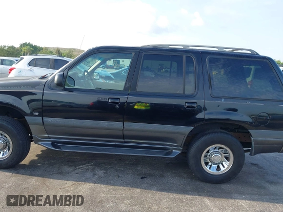 1999 Mercury Mountaineer z VIN 4M2ZU52P9XUJ11372, wystawiony jako IAAI lot #41849011 z przebiegiem 286 379 mil mil oraz . Historia ofert i sprzedaży dostępna na DreamBid. Obrazek 14.