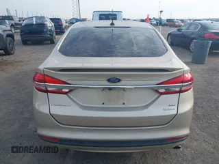 2018 Ford Fusion SE z VIN 3FA6P0HD6JR279927, wystawiony jako IAAI lot #42430172 z przebiegiem 145 080 mil mil oraz . Historia ofert i sprzedaży dostępna na DreamBid. Obrazek 16.