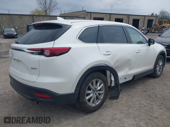 2017 Mazda CX-9 Sport with VIN JM3TCBBY3H0139514, listed as a IAAI auction lot 42082162 with 54,077 mi miles and . Bid and sale history available at DreamBid. Image 4.