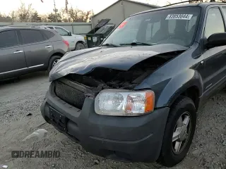 2001 Ford Escape XLS with VIN 1FMYU02191KA64617, listed as a Copart auction lot 83853044 with 187,594 mi miles and Salvage Title. Bid and sale history available at carsss.com. Image 12.