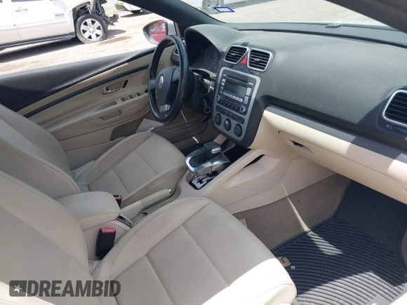 2009 Volkswagen Eos Komfort with VIN WVWBA71F49V016543, listed as a IAAI auction lot 42029360 with 76,657 mi miles and . Bid and sale history available at DreamBid. Image 5.