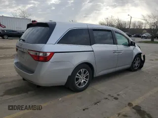 2012 Honda Odyssey EX-L with VIN 5FNRL5H60CB117376, listed as a Copart auction lot 50740725 with 163,716 mi miles and Salvage Title. Bid and sale history available at DreamBid. Image 3.
