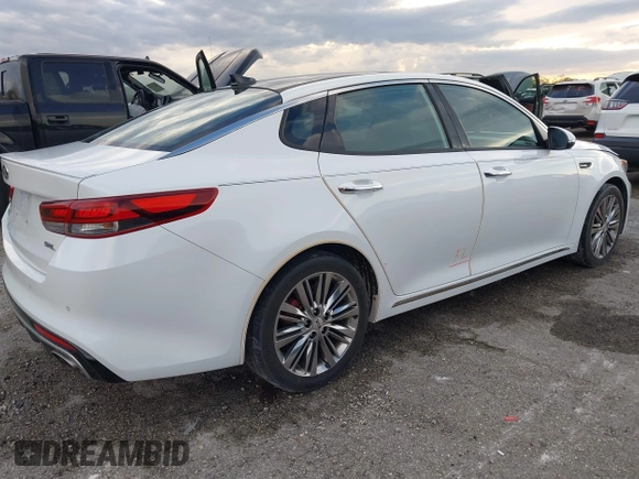 2018 Kia Optima SX with VIN 5XXGV4L21JG182103, listed as a IAAI auction lot 40522762 with 60,542 mi miles and . Bid and sale history available at DreamBid. Image 4.