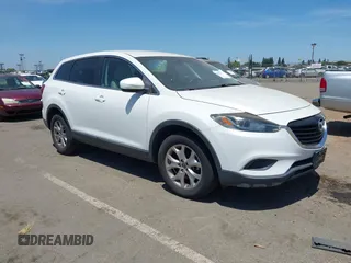 2014 Mazda CX-9 Touring with VIN JM3TB2CAXE0434500, listed as a IAAI auction lot 42609432 with 125,024 mi miles and . Bid and sale history available at DreamBid. Image 1.