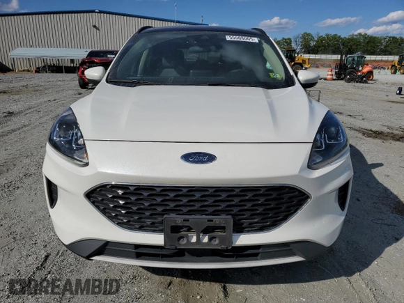 2020 Ford Escape SE with VIN 1FMCU9G62LUA20274, listed as a Copart auction lot 55508005 with 63,067 mi miles and Salvage title. Bid and sale history available at DreamBid. Image 5.