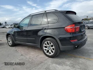 2012 BMW X5 35i z VIN 5UXZV4C51CL989449, wystawiony jako Copart lot #56762095 z przebiegiem 112 576 mil mil oraz Szkoda całkowita • Salvage title. Historia ofert i sprzedaży dostępna na DreamBid. Obrazek 2.