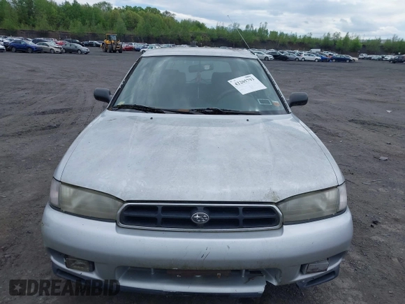 1998 Subaru Legacy L z VIN 4S3BK4353W7300794, wystawiony jako IAAI lot #42205793 z przebiegiem 227 539 mil mil oraz . Historia ofert i sprzedaży dostępna na DreamBid. Obrazek 6.