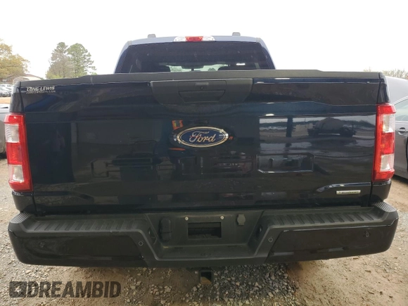 2023 Ford F-150 XL with VIN 1FTEW1EP5PKF67674, listed as a Copart auction lot 50348795 with 23,176 mi miles and Salvage title. Bid and sale history available at DreamBid. Image 6.