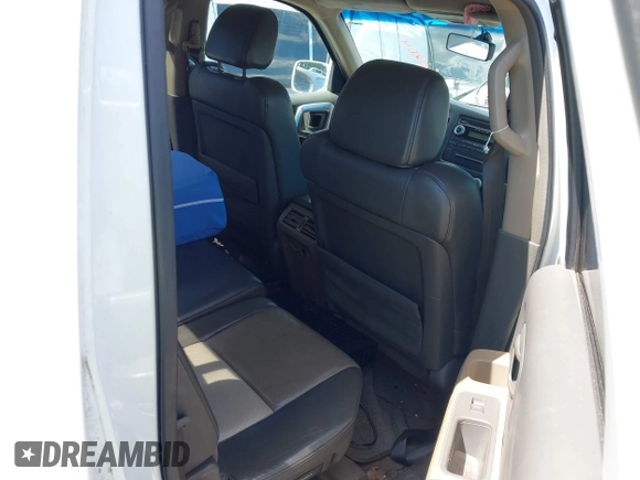2006 Honda Ridgeline RTL z VIN 2HJYK16506H512654, wystawiony jako IAAI lot #42245264 z przebiegiem 303 551 mil mil oraz . Historia ofert i sprzedaży dostępna na DreamBid. Obrazek 8.