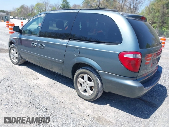 2005 Dodge Caravan SXT z VIN 2D4GP44L95R324232, wystawiony jako IAAI lot #42056320 z przebiegiem 200 459 mil mil oraz . Historia ofert i sprzedaży dostępna na DreamBid. Obrazek 3.