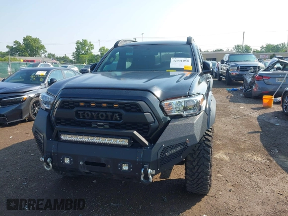 2017 Toyota Tacoma SR5 with VIN 3TMCZ5ANXHM099610, listed as a IAAI auction lot 42441050 with 85,046 mi miles and . Bid and sale history available at DreamBid. Image 12.