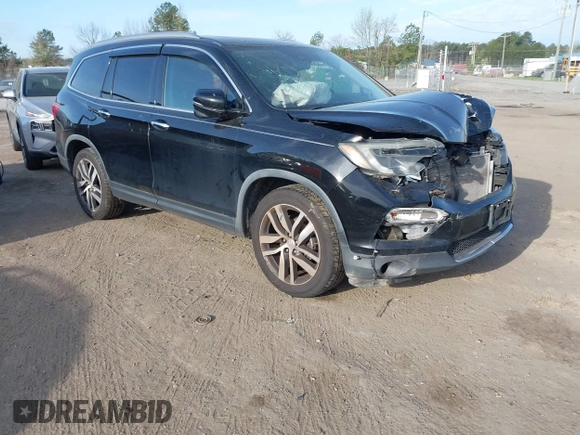 2017 Honda Pilot Touring with VIN 5FNYF6H9XHB062171, listed as a IAAI auction lot 41927969 with 210,633 mi miles. Bid and sale history available at carsss.com. Image 1.