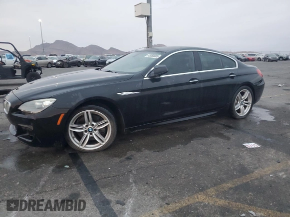 2013 BMW 6 Series 650i with VIN WBA6B2C50DD128323, listed as a Copart auction lot 43059985 with 106,861 mi miles and Clean Title. Bid and sale history available at DreamBid. Image 1.