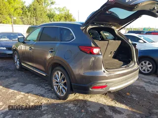 2018 Mazda CX-9 Grand Touring with VIN JM3TCBDY3J0231936, listed as a IAAI auction lot 42159391 with 105,125 mi miles and . Bid and sale history available at DreamBid. Image 3.