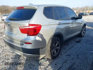 2011 BMW X3 28i with VIN 5UXWX5C50BL703124, listed as a IAAI auction lot 41563175 with 216,317 mi miles. Bid and sale history available at carsss.com. Image 4.