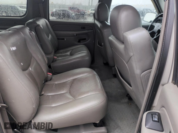 2004 Chevrolet Suburban Z71 z VIN 3GNFK16Z44G305168, wystawiony jako Copart lot #53900955 z przebiegiem 186 770 mil mil oraz Szkoda całkowita • Salvage title. Historia ofert i sprzedaży dostępna na DreamBid. Obrazek 11.