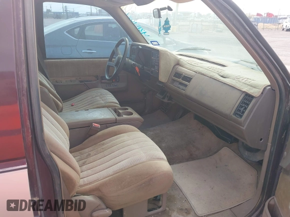 1993 GMC Suburban with VIN 1GKEC16KXPJ734150, listed as a IAAI auction lot 42114021 with 254,501 mi miles and . Bid and sale history available at DreamBid. Image 5.