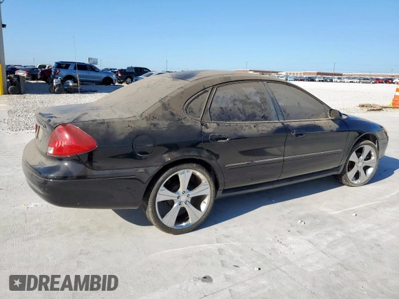 2002 Ford Taurus SE с VIN 1FAFP53252A202836, выставлен на аукционе Copart как лот 62285265 с пробегом 206 916 миль миль и Чистый • Clean title. История ставок и продаж доступна на DreamBid. Изображение 3.