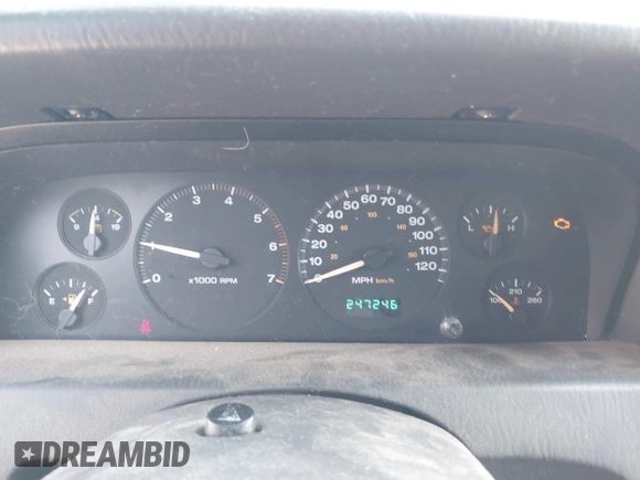 2003 Jeep Grand Cherokee Laredo with VIN 1J4GX48S53C504225, listed as a IAAI auction lot 41879669 with 247,246 mi miles. Bid and sale history available at carsss.com. Image 7.