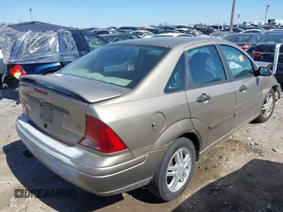 2003 Ford Focus SE with VIN 1FAFP34P03W240199, listed as a IAAI auction lot 41757940 with 91,852 mi miles and . Bid and sale history available at carsss.com. Image 4.