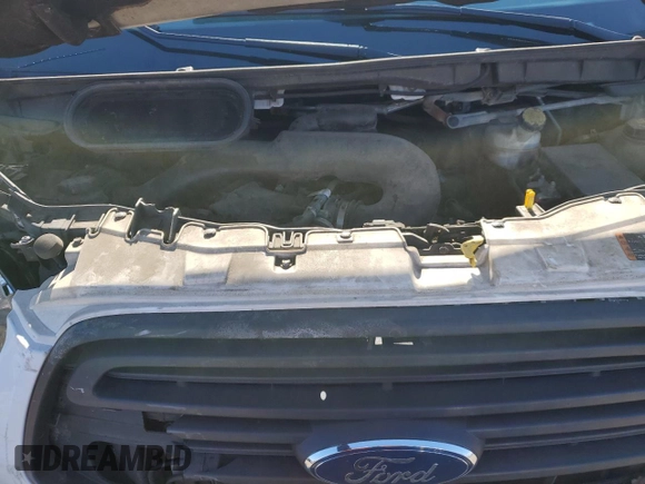 2017 Ford Transit z VIN 1FTYR2ZM2HKA16341, wystawiony jako Copart lot #45649195 z przebiegiem Nie podano mil oraz Szkoda całkowita • Salvage title. Historia ofert i sprzedaży dostępna na DreamBid. Obrazek 12.