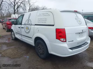 2014 Ram Cargo Van Tradesman with VIN 2C4JRGAG8ER428412, listed as a IAAI auction lot 41893130 with 97,411 mi miles. Bid and sale history available at carsss.com. Image 3.