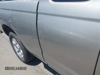 2000 Nissan Frontier XE z VIN 1N6DD26S9YC363236, wystawiony jako IAAI lot #42343821 z przebiegiem 187 720 mil mil oraz . Historia ofert i sprzedaży dostępna na DreamBid. Obrazek 16.