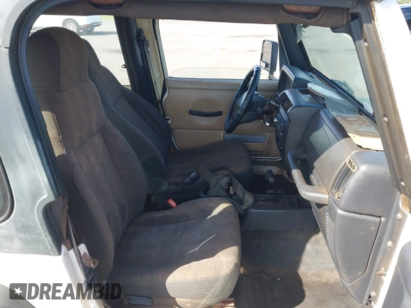 2004 Jeep Wrangler X z VIN 1J4FA39S04P747828, wystawiony jako IAAI lot #41484240 z przebiegiem Nie podano mil oraz . Historia ofert i sprzedaży dostępna na DreamBid. Obrazek 5.