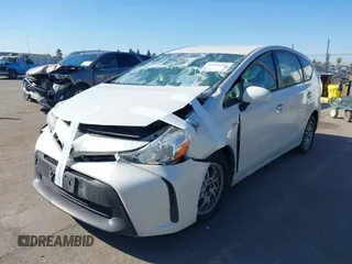 2017 Toyota Prius v Two with VIN JTDZN3EU4HJ067583, listed as a IAAI auction lot 41393495 with 316,410 mi miles. Bid and sale history available at carsss.com. Image 2.