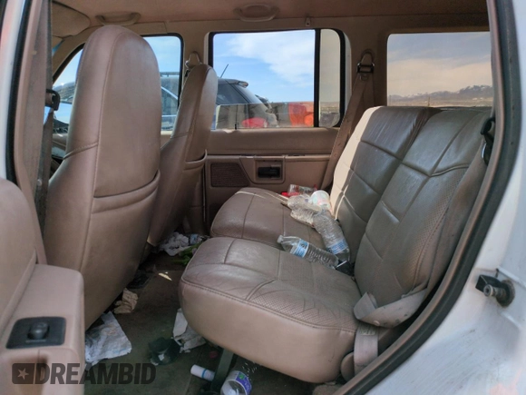 1992 Ford Explorer Eddie Bauer with VIN 1FMDU34X2NUE11927, listed as a Copart auction lot 52094875 with 53,449 mi miles and Salvage title. Bid and sale history available at DreamBid. Image 10.