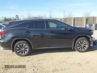2022 Lexus RX with VIN JTJHZKFA7N2037057, listed as a IAAI auction lot 41804899 with 157,549 mi miles. Bid and sale history available at carsss.com. Image 14.