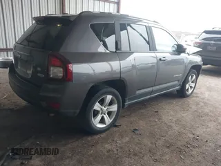 2016 Jeep Compass Latitude with VIN 1C4NJCEA2GD599833, listed as a IAAI auction lot 41507729 with 107,187 mi miles. Bid and sale history available at carsss.com. Image 4.